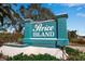 Entrance to Perico Island is marked with a big sign surrounded by greenery at 318 108Th St W # 318, Bradenton, FL 34209