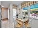 Cozy dining area with plenty of natural light and neutral decor at 318 108Th St W # 318, Bradenton, FL 34209