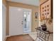 Welcoming entryway with neutral tones, a decorative table, and a view to the outside at 318 108Th St W # 318, Bradenton, FL 34209