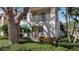 Charming two-story condo with landscaped front yard and balcony at 318 108Th St W # 318, Bradenton, FL 34209