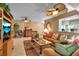 Comfortable living room featuring stylish ceiling fans and comfortable seating at 318 108Th St W # 318, Bradenton, FL 34209