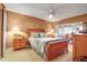 Inviting main bedroom with comfortable decor and furnishings with views of the bright dining space at 318 108Th St W # 318, Bradenton, FL 34209