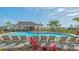Enjoy this community pool area with lounge chairs and a covered pavilion, perfect for relaxing and socializing at 427 157Th E Ct, Bradenton, FL 34212