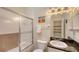 Bathroom featuring granite countertops, framed mirror and a glass door shower at 4423 Park Lake N Ter, Bradenton, FL 34209