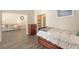 Bedroom with a full bed and view of the living room through the doorway at 4423 Park Lake N Ter, Bradenton, FL 34209