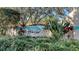 Entrance sign for 'Forty Three West' framed by lush greenery at 4423 Park Lake N Ter, Bradenton, FL 34209