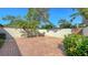 Private brick patio area perfect for outdoor seating and relaxation on a beautiful sunny day at 4423 Park Lake N Ter, Bradenton, FL 34209
