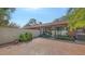 Wonderful patio area, enclosed with neutral wall, and floor designed with red brick at 4423 Park Lake N Ter, Bradenton, FL 34209