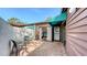Charming brick patio with seating, sliding glass doors, and convenient access to the home's entrance at 4423 Park Lake N Ter, Bradenton, FL 34209