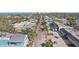 Aerial view capturing the commercial buildings, streets, and community of Siesta Key at 4822 Ocean Blvd # 11E, Sarasota, FL 34242
