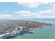 Sweeping aerial view showcasing the community, beach, and sparkling ocean at 4822 Ocean Blvd # 11E, Sarasota, FL 34242