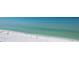 Experience the tranquility of Siesta Key Beach, known for its stunning turquoise waters, powdery white sands, and sunny skies at 4822 Ocean Blvd # 11E, Sarasota, FL 34242