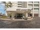 Inviting condo building entrance, showcasing clean architecture and landscaping at 4822 Ocean Blvd # 11E, Sarasota, FL 34242