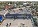 Two story building with dedicated parking and storefronts in a sunny location near other businesses and neighborhood residences at 4822 Ocean Blvd # 11E, Sarasota, FL 34242