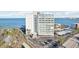 Attractive high-rise building with stunning views of the ocean in the distance at 4822 Ocean Blvd # 11E, Sarasota, FL 34242