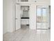 Bright living room offers seamless flow to bath and scenic balcony views at 4822 Ocean Blvd # 11E, Sarasota, FL 34242