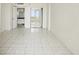Spacious living room showcasing neutral tones and easy access to other rooms at 4822 Ocean Blvd # 11E, Sarasota, FL 34242