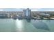 Beautiful waterfront building nestled along the coastline surrounded by lush foliage at 4822 Ocean Blvd # 11E, Sarasota, FL 34242