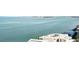 Expansive waterfront view showcasing turquoise waters and the distant city skyline at 4822 Ocean Blvd # 11E, Sarasota, FL 34242