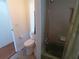 Bathroom featuring a toilet, sink, and bathtub with shower at 5235 Cherry Hill Ave, Sarasota, FL 34234