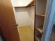This closet is perfect for organizing clothes and has shelves for storage at 5235 Cherry Hill Ave, Sarasota, FL 34234