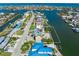 Aerial view of waterfront property with canal access and neighborhood street in waterfront community at 525 68Th St St, Holmes Beach, FL 34217