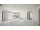 Open living room featuring sliding glass doors and lots of room at 525 68Th St St, Holmes Beach, FL 34217