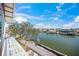Scenic waterfront view of canal featuring neighboring homes and boat docks at 525 68Th St St, Holmes Beach, FL 34217