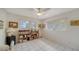 Bright bedroom with lots of light from windows and tile flooring at 534 Sutton Pl, Longboat Key, FL 34228