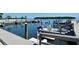 Community boat dock for easy access to waterfront recreation and enjoyment at 534 Sutton Pl, Longboat Key, FL 34228