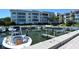 Beautiful waterfront condo community with private boat docks and lush landscaping along the Longboat Key waterfront at 534 Sutton Pl, Longboat Key, FL 34228