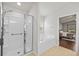 Bright bathroom featuring a glass-enclosed shower and separate soaking tub at 5342 98Th E Ave, Parrish, FL 34219