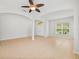 Open-concept living room with high ceilings and large windows at 5342 98Th E Ave, Parrish, FL 34219