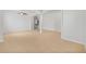 Open and airy living space with tile floors, ceiling fan, and arched doorways at 5342 98Th E Ave, Parrish, FL 34219
