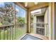 Spacious screened lanai offering views of the surrounding greenery and providing a relaxing outdoor retreat at 5700 Bentgrass Dr # 209, Sarasota, FL 34235