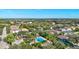 Community pool, playground, and lush green landscaping create an inviting and Gathering-friendly atmosphere in this aerial shot at 6156 41St E St, Bradenton, FL 34203