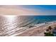 Tranquil beach front, beautiful waterfront views of sandy beach, blue water and perfect community on the Gulf Coast at 6156 41St E St, Bradenton, FL 34203