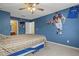 Comfortable bedroom with fun sport-themed accents, making it perfect for a sports enthusiast at 6156 41St E St, Bradenton, FL 34203