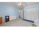 Spacious bedroom features blue accent rug and ample closet space at 6156 41St E St, Bradenton, FL 34203