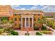 Elegant Manatee County building exterior with colonial architectural details, columns, and landscaped grounds at 6156 41St E St, Bradenton, FL 34203