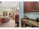 Dining room area showcases hardwood floors, chandelier, and open access to dining and seating areas at 6156 41St E St, Bradenton, FL 34203