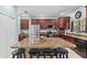 Well-equipped kitchen featuring granite countertops, stainless appliances, and a center island with barstool seating at 6156 41St E St, Bradenton, FL 34203