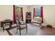 Cozy living room featuring vintage furniture and natural light at 6156 41St E St, Bradenton, FL 34203
