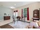 Charming living room showcasing decorative furniture and french doors at 6156 41St E St, Bradenton, FL 34203