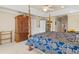 The main bedroom has a four-poster bed and large armoire, as well as ample closet space at 6156 41St E St, Bradenton, FL 34203