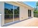 Spacious patio with sliding glass doors, seamlessly blending indoor and outdoor living spaces at 6156 41St E St, Bradenton, FL 34203