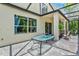 Covered patio featuring an outdoor dining area with access to the home's interior at 6156 41St E St, Bradenton, FL 34203