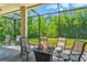 Outdoor patio with comfortable seating and a fire pit, perfect for gatherings at 6156 41St E St, Bradenton, FL 34203