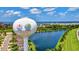 Bradenton, Florida water tower with tropical imagery against a backdrop of a lake and clear blue skies at 6156 41St E St, Bradenton, FL 34203