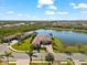 Expansive aerial view highlighting the property's prime lakeside location and stunning surroundings at 629 River Enclave Ct, Bradenton, FL 34212